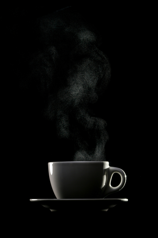 Steaming Coffee Black Background